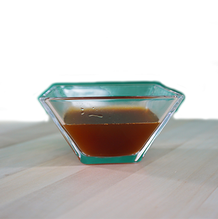  sauce,  gravy,  glass bowl,  triangular bowl,  brown liquid